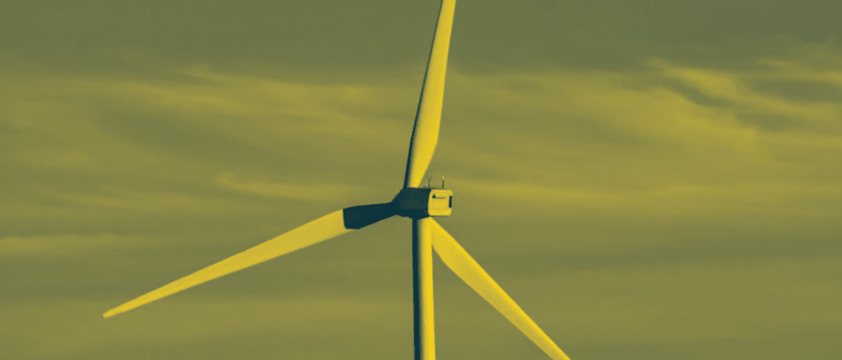 Wind turbine against the background of a field