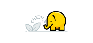 Ein Elefant wässert eine Pflanze.